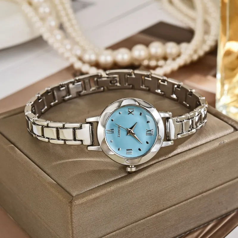 Sleek Ice Blue Roman Dial Silver Bracelet Watch